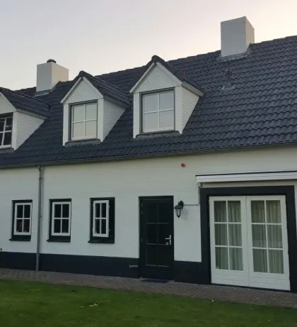 Dakcoating aanbrengen woning