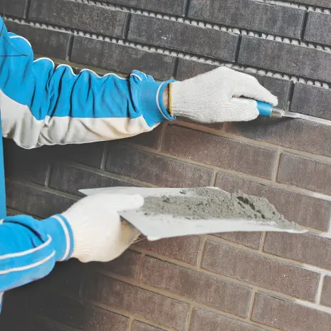 Gevel reinigen en voegen